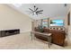 Bright living room with tile flooring, modern ceiling fan, and sliding doors to the outside at 1606 Burryport Dr, Orlando, FL 32837