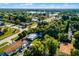 Aerial view of neighborhood near a lake at 1649 Weybridge St, Deltona, FL 32725
