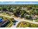 Aerial shot of the property, showcasing the home's location in a tree-lined neighborhood at 1649 Weybridge St, Deltona, FL 32725