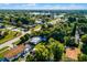 Aerial view of neighborhood near a lake at 1649 Weybridge St, Deltona, FL 32725