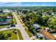 Aerial shot of the property, showcasing the home's location in a tree-lined neighborhood at 1649 Weybridge St, Deltona, FL 32725
