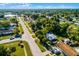 Aerial shot of the property, showcasing the home's location in a tree-lined neighborhood at 1649 Weybridge St, Deltona, FL 32725