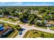 Aerial shot of the property, showcasing the home's location in a tree-lined neighborhood at 1649 Weybridge St, Deltona, FL 32725
