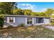 Charming single story home with simple landscaping and a clean, minimalist exterior design at 1649 Weybridge St, Deltona, FL 32725