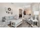Bright living room with plush seating, neutral decor, and open layout, great for gatherings at 165 Fig Tree Run, Longwood, FL 32750