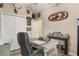 Inviting office showcases decor, a work desk, comfortable seating, and ample closet space at 165 Fig Tree Run, Longwood, FL 32750