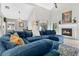 Spacious living room features a fireplace, high ceilings and comfortable sectional sofa at 1916 Excalibur Dr, Orlando, FL 32822
