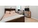 Cozy bedroom with soft lighting, stylish decor, and a comfortable workspace for study or hobbies at 2718 Limerick Cir, Grand Island, FL 32735