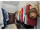 Walk-in closet features ample storage space with custom shelving and hanging rods at 2718 Limerick Cir, Grand Island, FL 32735