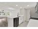 Bright kitchen features stainless steel appliances, a breakfast bar, and an open floor plan at 2739 N Poinciana Blvd # 77, Kissimmee, FL 34746