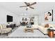 Modern living area flows into kitchen, creating an open and inviting space for living and entertaining at 2739 N Poinciana Blvd # 77, Kissimmee, FL 34746