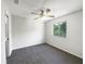 Neutral bedroom features updated carpet and a window letting in great natural light at 281 Covent Gardens Pl, Deltona, FL 32725