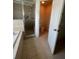 Bathroom featuring shower, toilet room, and soaking tub at 402 Big Sioux Ct, Kissimmee, FL 34759