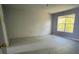 Bright bedroom with large window and carpeted floors, offering comfort and natural light at 402 Big Sioux Ct, Kissimmee, FL 34759