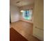 Dining area with tile floors and a large window providing natural light at 402 Big Sioux Ct, Kissimmee, FL 34759
