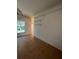 Charming dining area with tile flooring and natural light, ready for Gathering meals at 402 Big Sioux Ct, Kissimmee, FL 34759