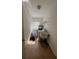 Functional laundry room with washer, dryer, utility sink and window for natural light at 402 Big Sioux Ct, Kissimmee, FL 34759