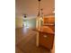 Open-concept living space with tile flooring, connecting the kitchen and living area for seamless living at 402 Big Sioux Ct, Kissimmee, FL 34759