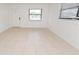 Bright living area offers great natural light and tiled flooring at 4469 Evers Pl, Orlando, FL 32811
