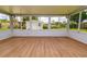 Enclosed sunroom provides extra space and light with backyard view at 4469 Evers Pl, Orlando, FL 32811