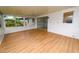 Enclosed sunroom provides extra space and light with backyard view at 4469 Evers Pl, Orlando, FL 32811
