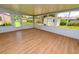 Enclosed sunroom provides extra space and light with backyard view at 4469 Evers Pl, Orlando, FL 32811