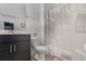 Bathroom featuring a patterned shower curtain, tile floors, and modern finishes at 461 Diamond Dove Cv, Winter Springs, FL 32708