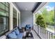 Relaxing outdoor seating on the front porch at 461 Diamond Dove Cv, Winter Springs, FL 32708