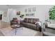 Cozy living room with elegant furniture and contemporary artwork at 461 Diamond Dove Cv, Winter Springs, FL 32708