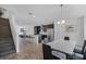 Spacious kitchen and living area with modern appliances, an open floor plan, and lots of natural light at 461 Diamond Dove Cv, Winter Springs, FL 32708