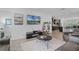 Stylish living room with modern furniture and an open layout at 461 Diamond Dove Cv, Winter Springs, FL 32708