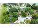 Aerial view highlighting a peaceful neighborhood, mature trees and proximity to community amenities at 4757 Goldsboro Ct, Orlando, FL 32811
