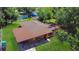 A beautiful aerial shot of a well-maintained property with nice landscaping at 4757 Goldsboro Ct, Orlando, FL 32811