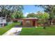 Charming single-story home with a covered carport and well-manicured lawn at 4757 Goldsboro Ct, Orlando, FL 32811