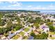 Located in a vibrant community, this property features a cozy home, lush landscaping, and easy access to amenities at 500 E Gottsche Ave, Eustis, FL 32726