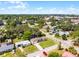 Home situated on a lovely lot with well-maintained lawns and an attached garage near local roadways at 500 E Gottsche Ave, Eustis, FL 32726
