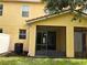Exterior backyard with an AC unit and a screened lanai at 5377 Via Appia Way, Sanford, FL 32771
