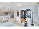 Open-concept living area featuring modern furnishings and seamless flow to the adjacent kitchen at 6014 Tree Crossing Ln, St Cloud, FL 34771