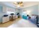 Bright office with built-in desks, ample storage and windows, creating a functional and inviting workspace at 706 Lynn Ave, New Smyrna Beach, FL 32168
