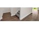 Hallway with wood floors and stairs at 7367 Catania Loop, Clermont, FL 34714