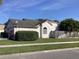 Single story home featuring tidy landscaping, a fenced yard, and an attached two car garage at 8647 Black Mesa Dr, Orlando, FL 32829