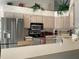 Bright kitchen featuring stainless steel appliances, ample counter space, and light cabinets at 8647 Black Mesa Dr, Orlando, FL 32829