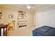 Comfortable bedroom featuring a desk, bookshelf, and daybed, perfect for a or guest at 8752 Lookout Pointe Dr, Windermere, FL 34786