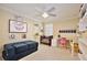 Well-lit bedroom featuring a crib, desk, and daybed, perfect for a or guest at 8752 Lookout Pointe Dr, Windermere, FL 34786
