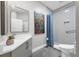 This is a bright bathroom with modern vanity and glass enclosed shower at 9353 Gotha Rd, Windermere, FL 34786