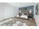 Serene main bedroom with a large bed, soft lighting, and ample closet space for storage at 9353 Gotha Rd, Windermere, FL 34786