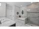 This bathroom has a soaking tub, glass shower and double sinks at 100 Verde Way, Debary, FL 32713