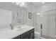 Modern bathroom with a glass-enclosed shower, sleek vanity, and stylish fixtures at 100 Verde Way, Debary, FL 32713