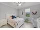 bedroom featuring soft colors, hardwood floors, and ample natural light at 100 Verde Way, Debary, FL 32713