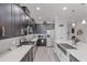 Gourmet kitchen features a gas range, stainless steel appliances, ample counter space, and stylish backsplash at 100 Verde Way, Debary, FL 32713
